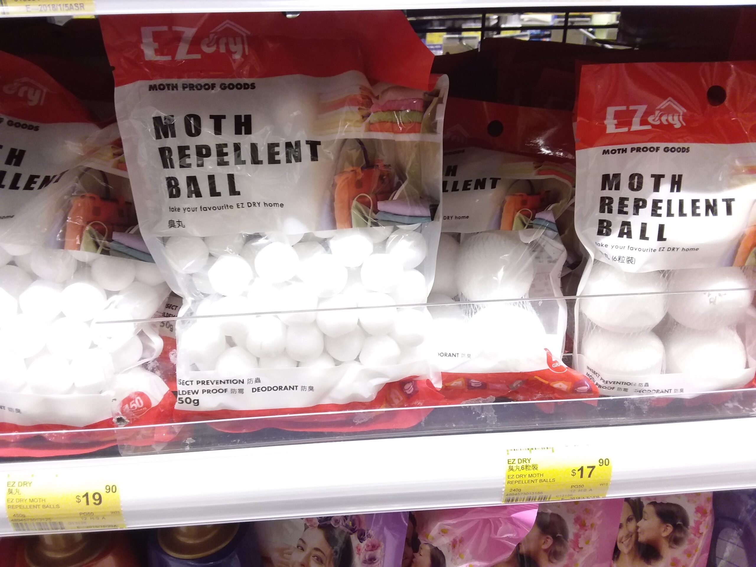 shelf-with-packs-of-moth-balls